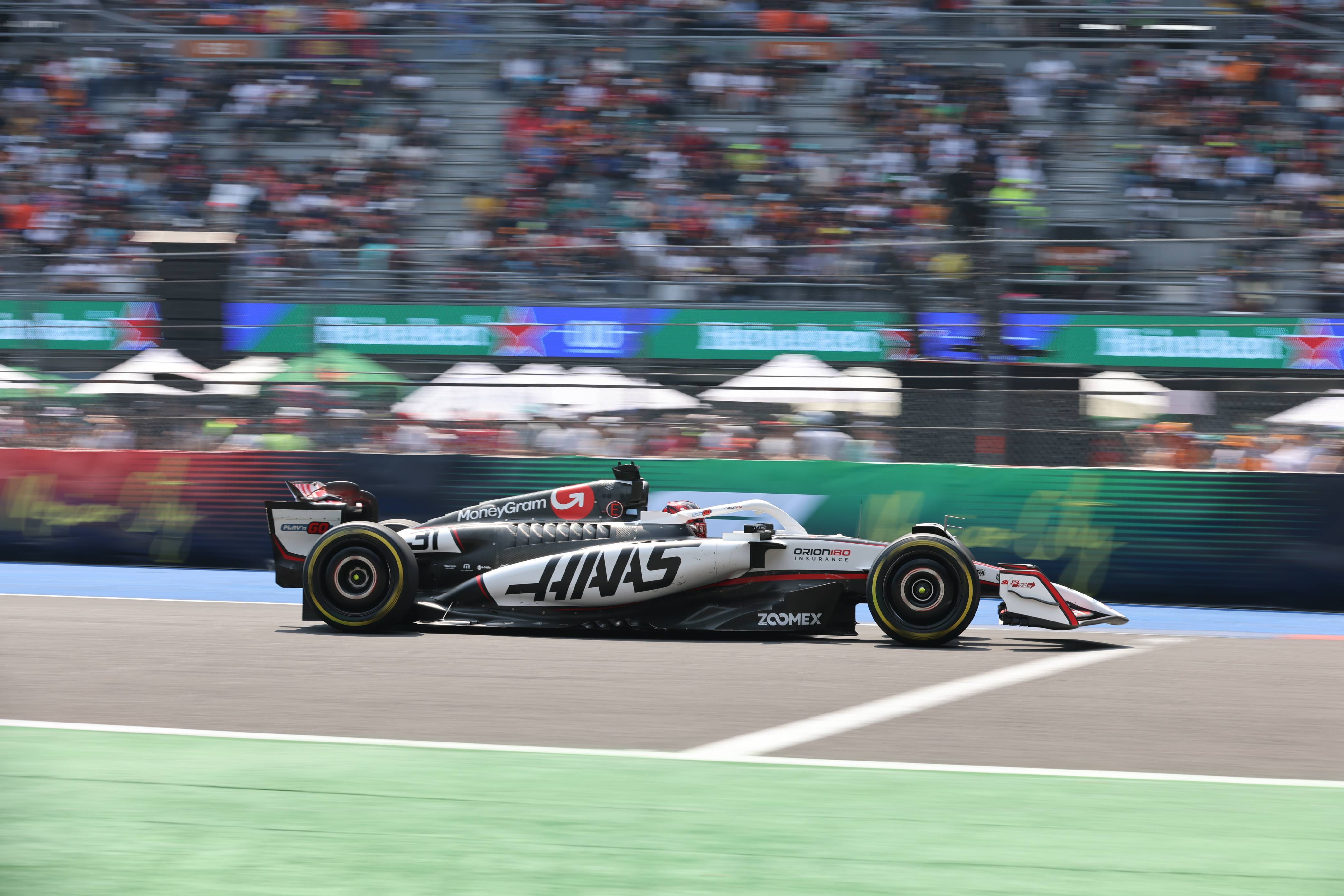 红牛车队鏖战哈斯车队,阿隆索点燃赛场 红牛车队鏖战哈斯车队,阿隆索点燃赛场